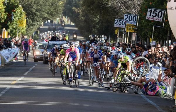 Riders swerve to avoid a crash 150 metres from the finish line.