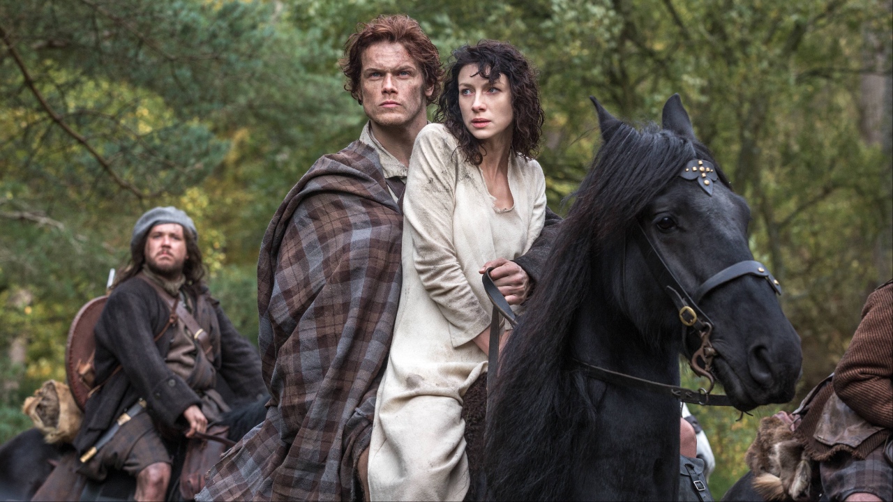 Sam Heughan as Jamie and Caitriona Balfe as Claire in Outlander's pilot