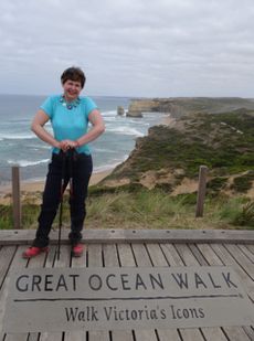 Faye Smith poses for a photo on the Great Ocean Walk in Victoria, Australia
