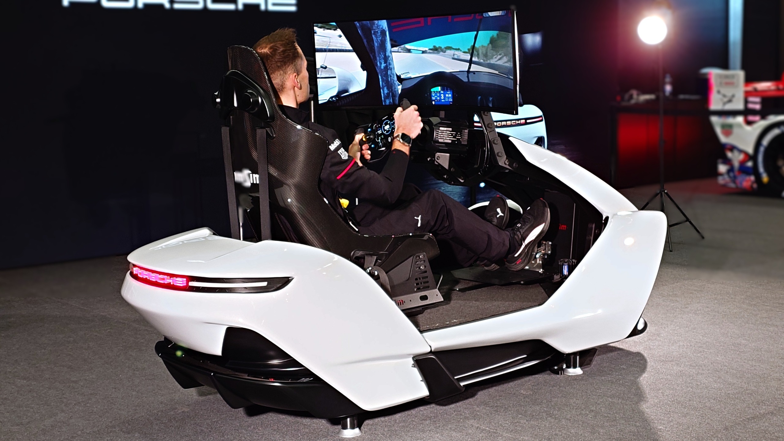 This all-in-one package of high-end gaming PC, racing simulator, and exquisite Porsche design is not for regular folks, and that's OK. 