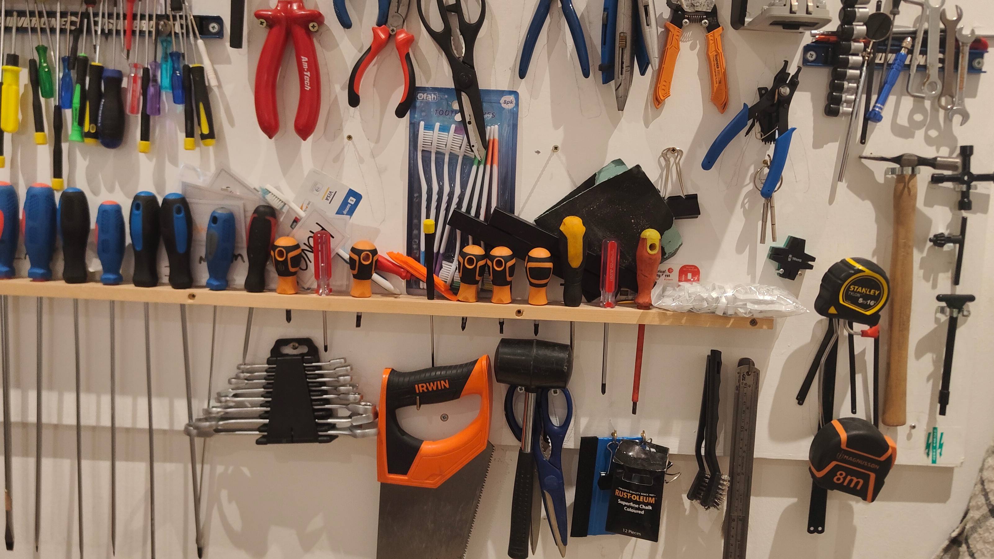 A shelf full of repair tools.