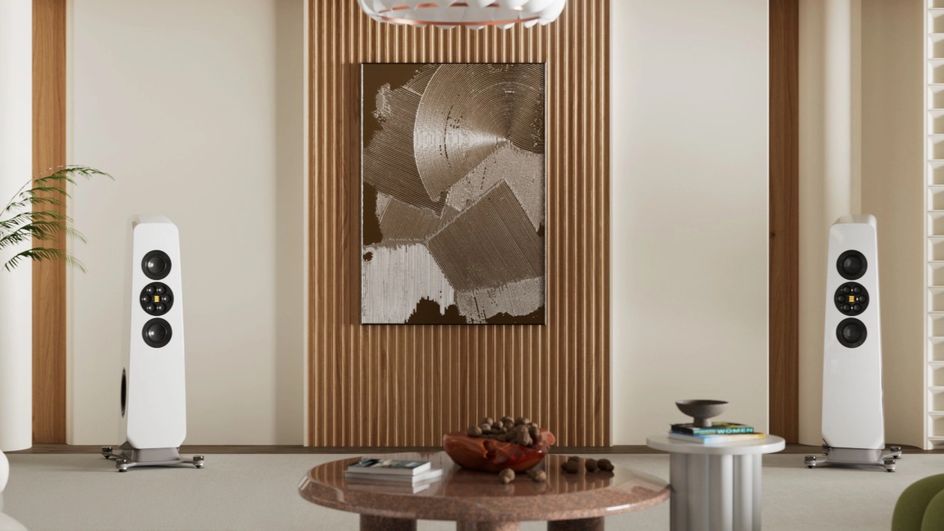 Elac Concentro M 807 in white flanking a wooden panel