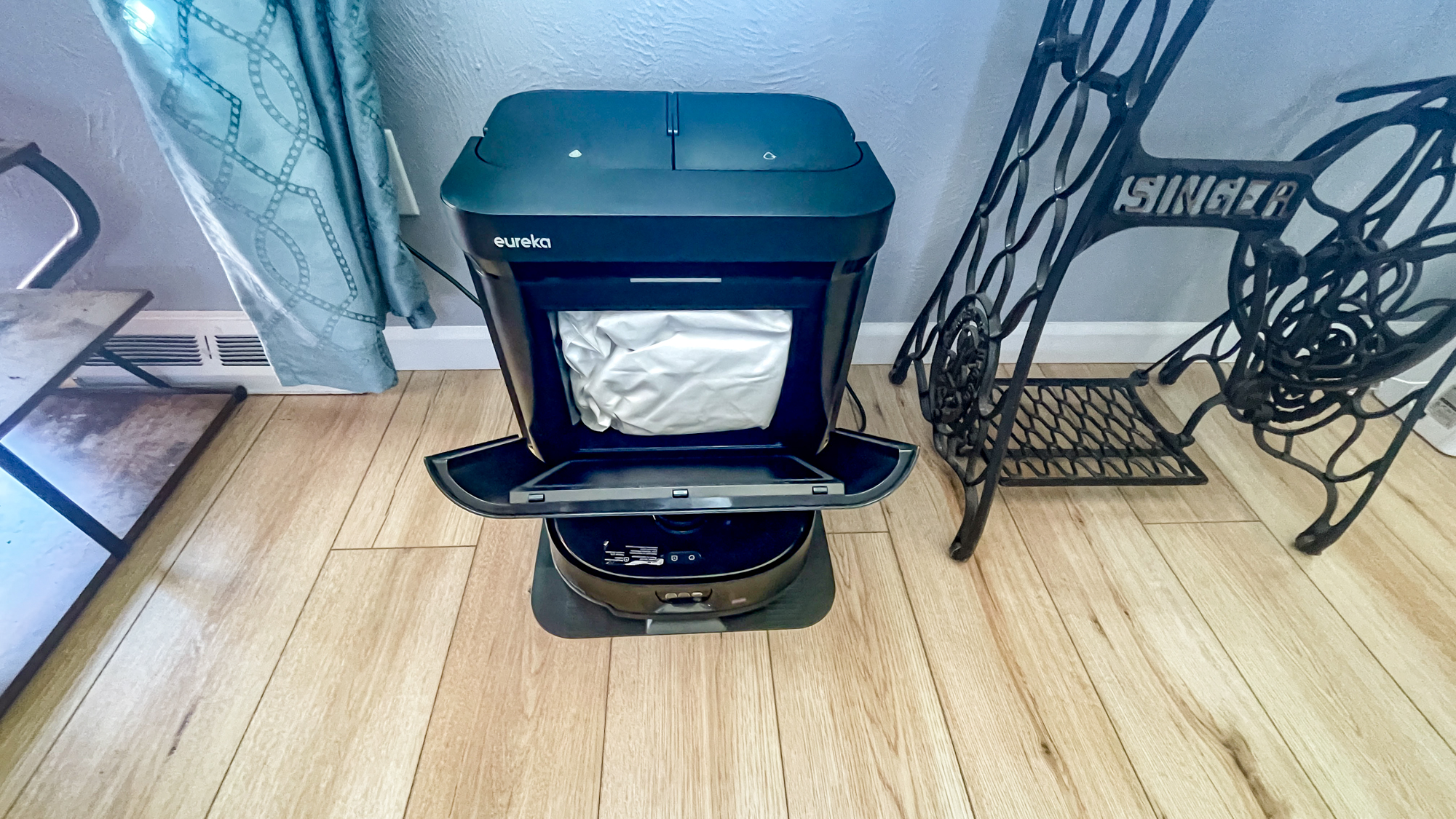 Eureka J15 Max Ultra robot vacuum on hard wood floor