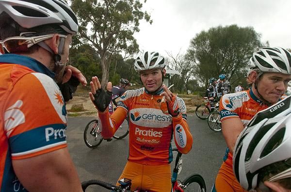 Stage winner Steele Von Hoff explains his victory to his Genesys Wealth Advisers teammates atop the You Yangs.