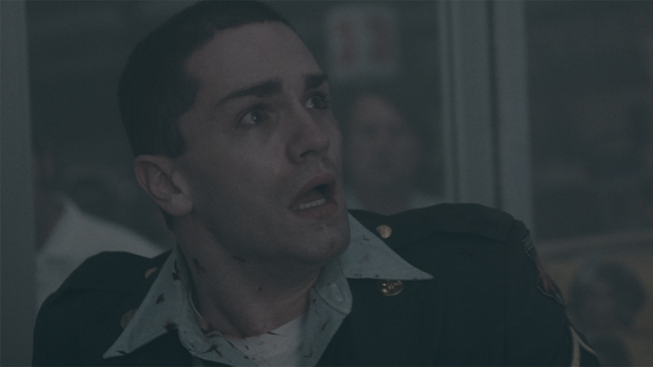 Sam Witwer looking scared in The Mist 