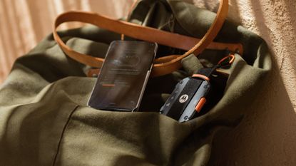 Motorola Defy Satellite Link dongle on backpack
