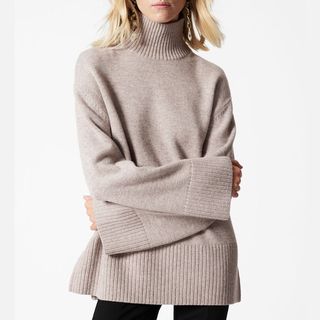 Image of beige turtle neck jumper 