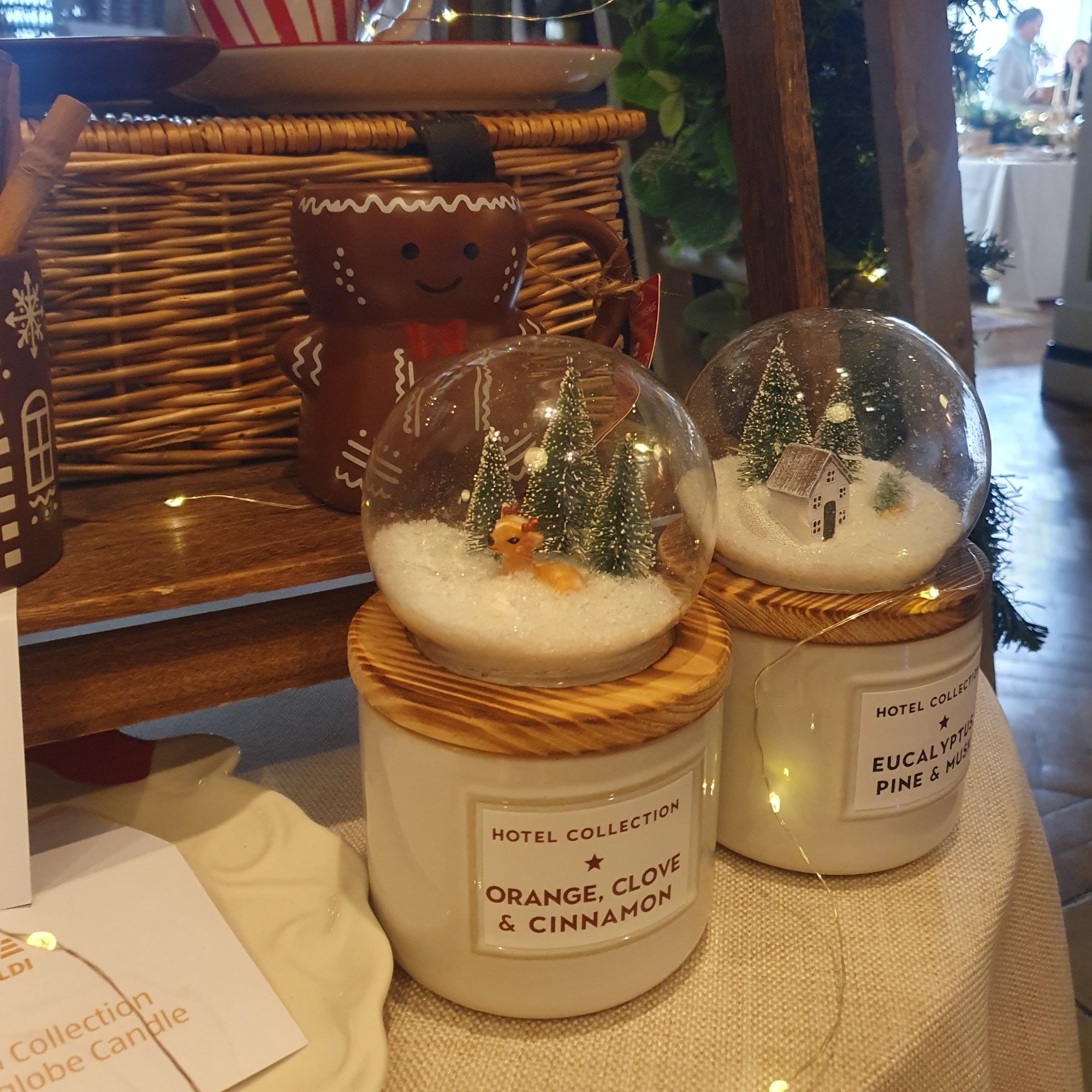 Aldi's snow globe scented candles displayed at the retailer's Christmas press preview for 2026