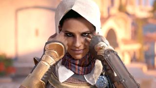 Aya pulling on her hood in Assassin's Creed Origins.