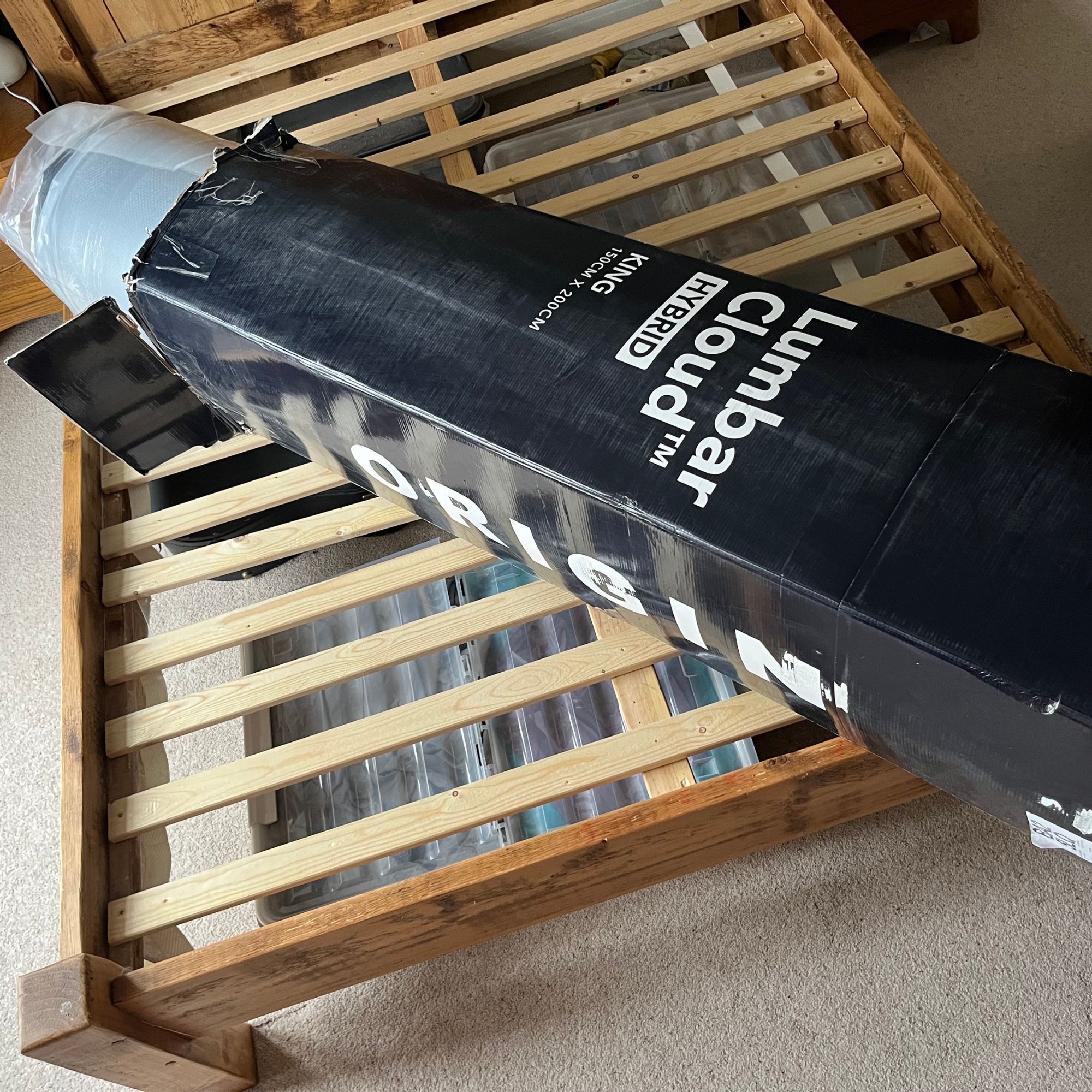Origin LumbarCloud mattress in a box on wooden bedframr