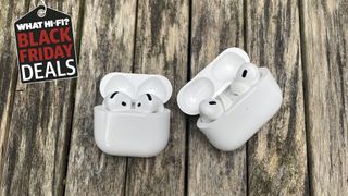 AirPods Pro 2 and AirPods 4 sitting on a wooden table