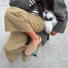 Influencer wearing minimalist suede ballet flats