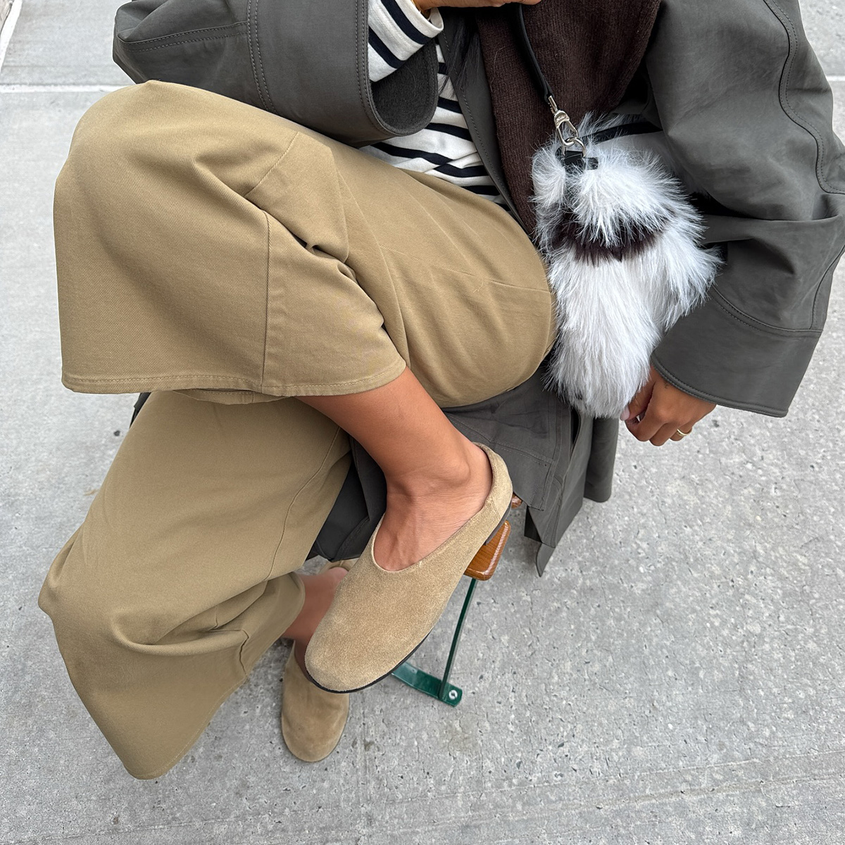 Influencer wearing minimalist suede ballet flats