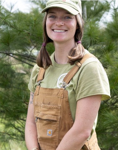 Photo of Marta Lynch in front of a tree