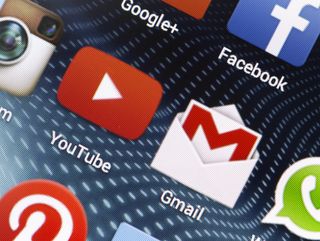 Gmail and YouTube icons on a smartphone screen