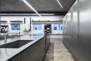 the stainless steel and aluminium kitchen