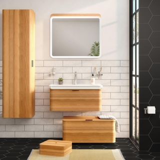 bathroom with wall cupboard and wood storage