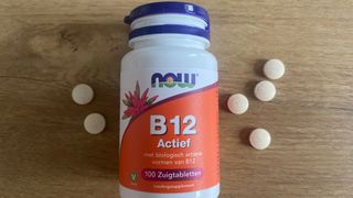 Now B12 pills and container on a table