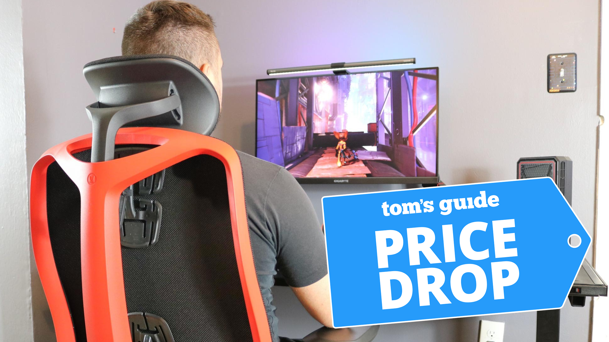 Man playing PC games on Herman Miller Vantum chair