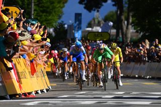 Wout van Aert (Jumbo-Visma) sprints to victory on stage 8 of the Tour de France 2022