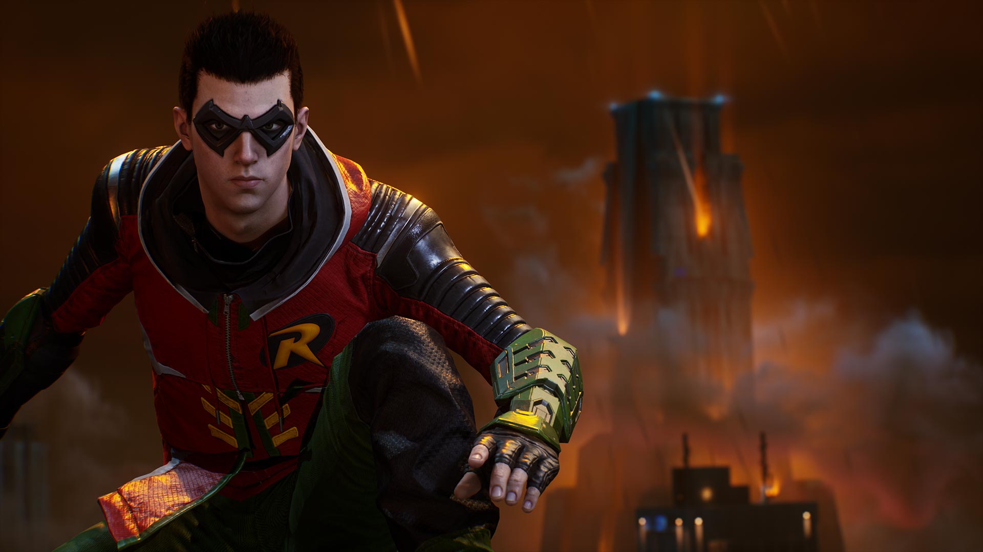 Gotham Knights - Robin does a superhero pose in front of a skyscraper or a really large vape pen