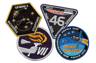 Separated by 50 years, the crew patches for Gemini 6 and Gemini 7 and Soyuz TMA-19M and ISS Expedition 46.