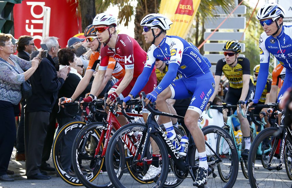 Fromer teammates Tony Martin and Zdenek Stybar catch up at the start of stage 1