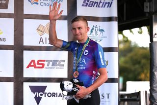 BALLARAT AUSTRALIA JANUARY 14 Cameron Scott of Australia on third place poses on the podium ceremony after the Australian Cycling National Championships 2022 Criterium Mens Elite a 44km race from Ballarat to Ballarat AusCyclingAus on January 14 2022 in Ballarat Australia Photo by Con ChronisGetty Images