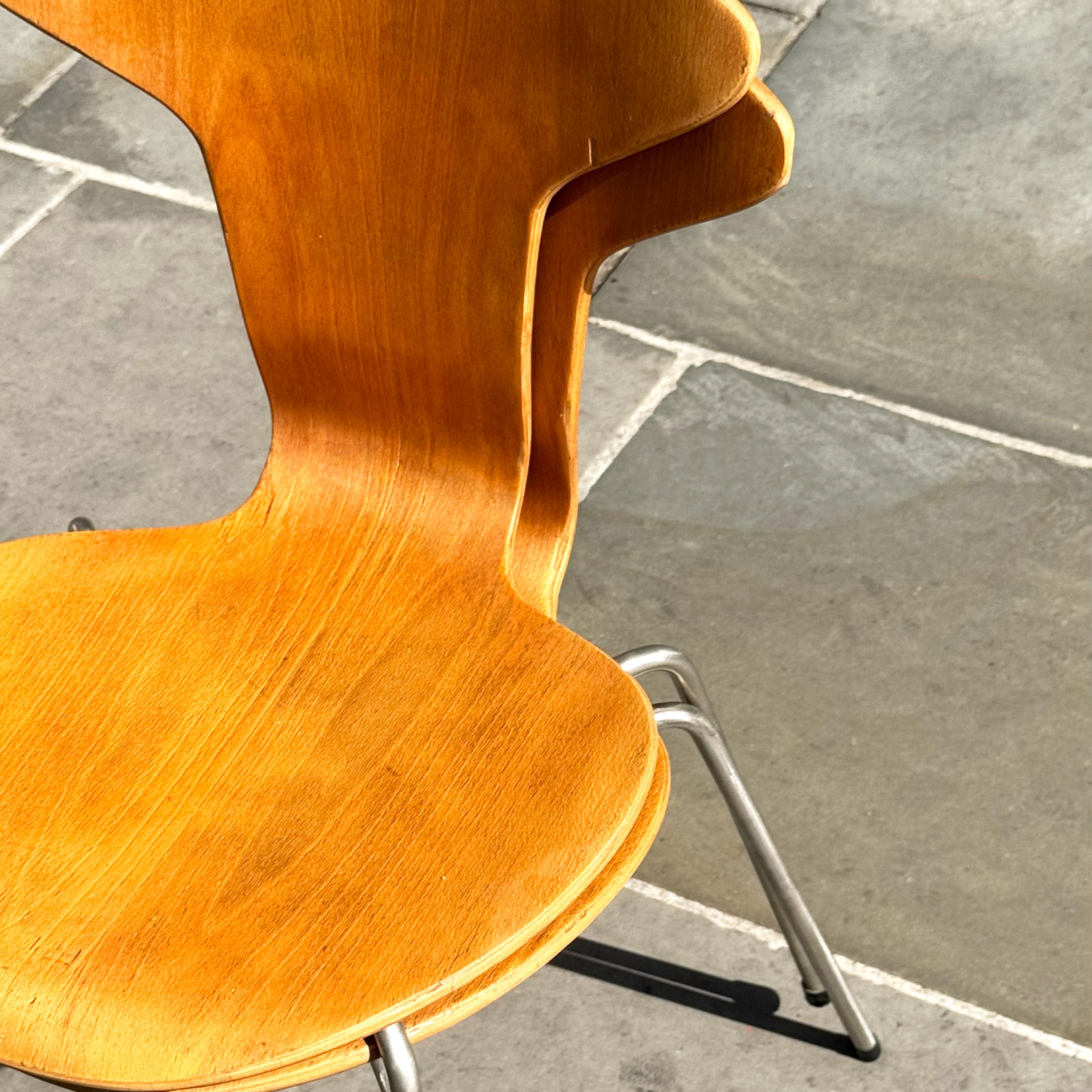 School desks and chairs by Arne Jacobsen, with green desk tops and wood veneer details