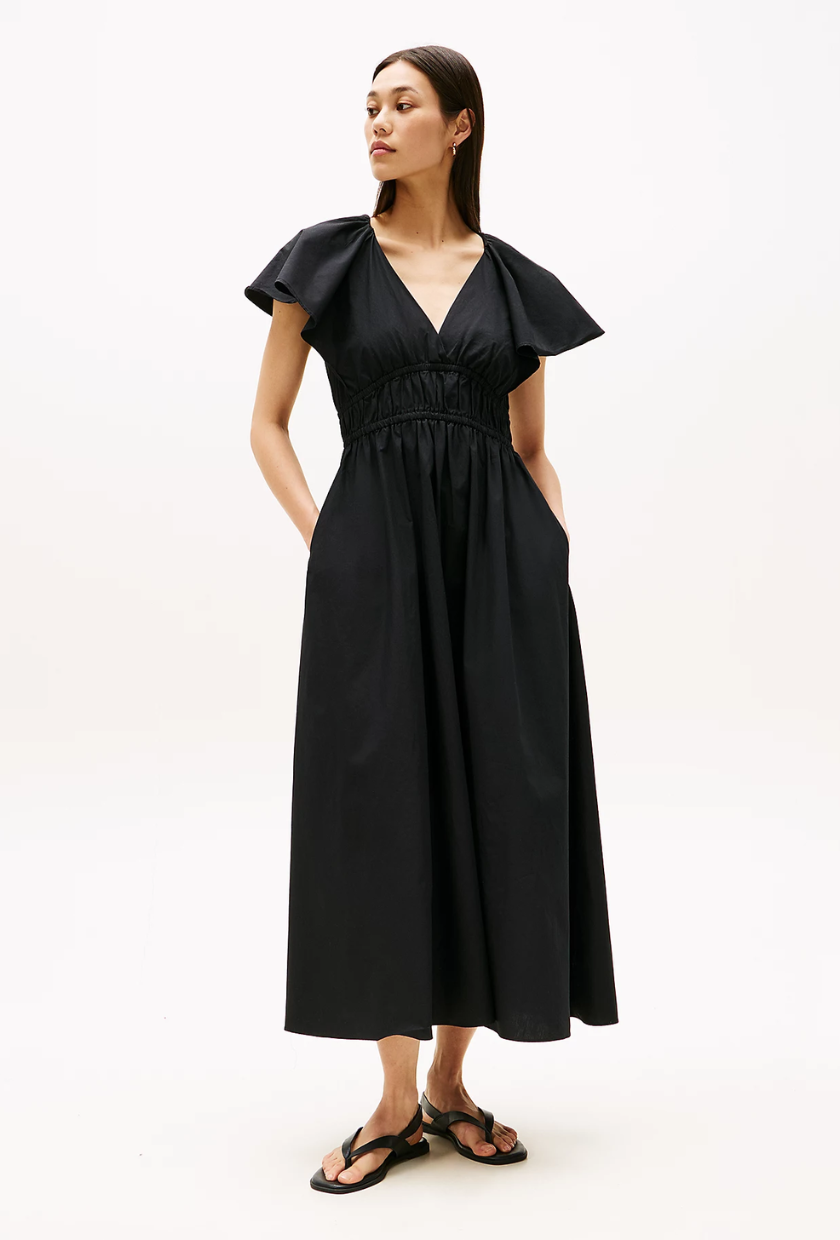 An image of a black Tommy Hilfiger dress.