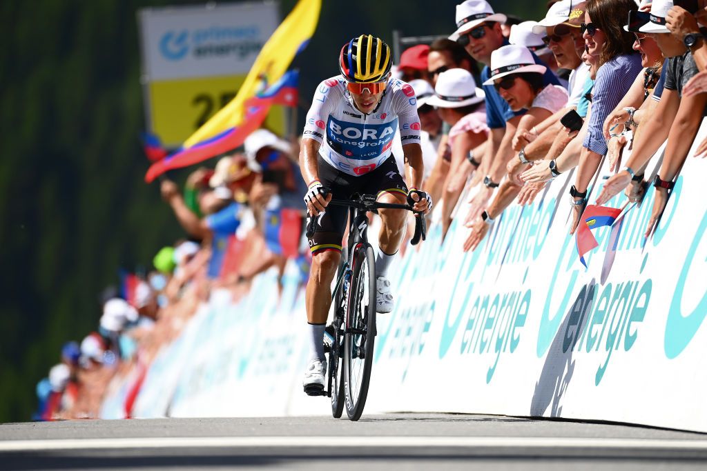 MALBUM SWITZERLAND JUNE 18 Sergio Andres Higuita Garcia of Colombia and Team Bora Hansgrohe White Best Young Rider Jersey crosses the finishing line during the 85th Tour de Suisse 2022 Stage 7 a 1946km stage from Ambri to Malbun 1560m tourdesuisse2022 WorldTour on June 18 2022 in Malbun Switzerland Photo by Tim de WaeleGetty Images