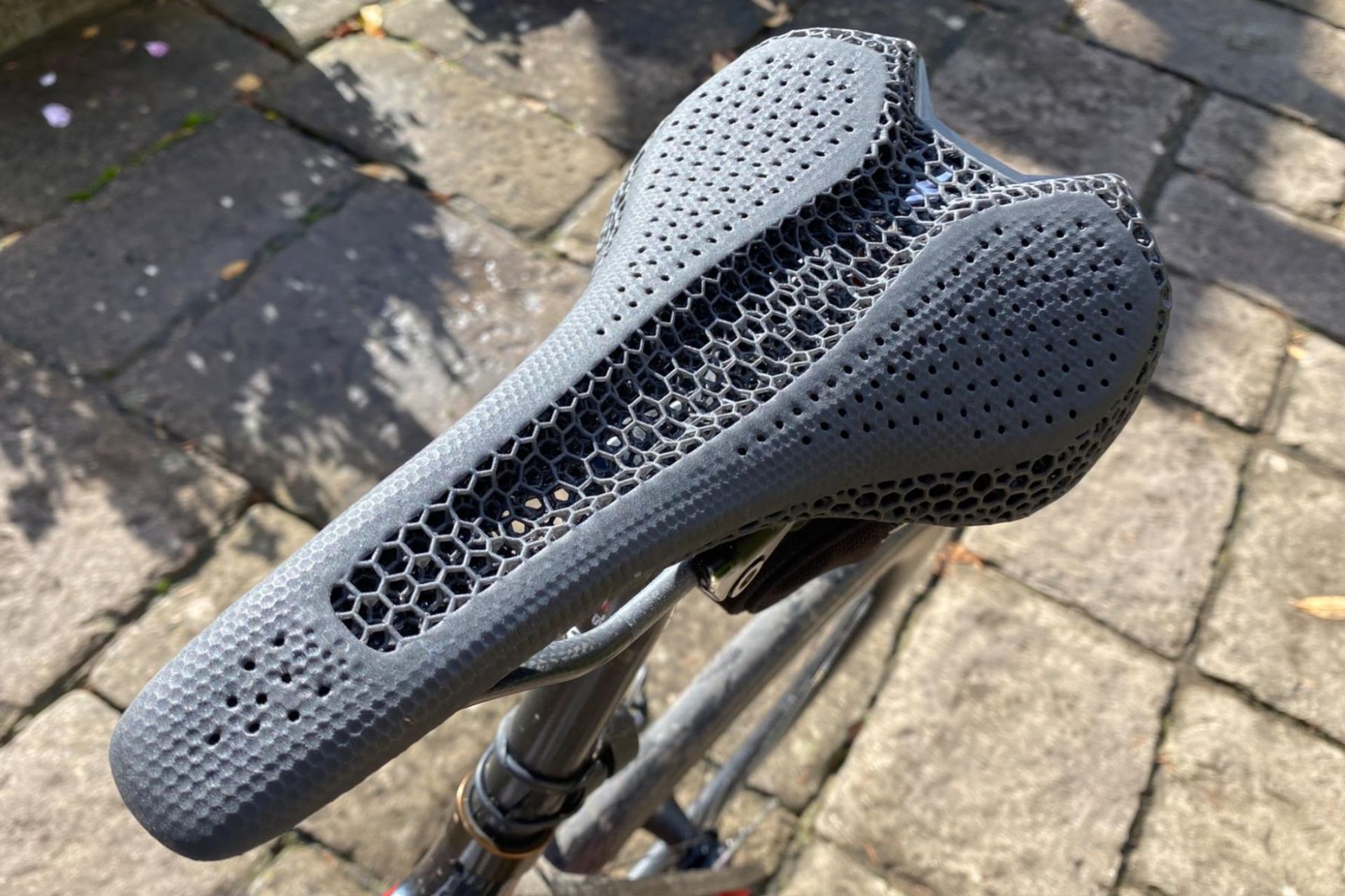 Image shows the Specialized S-Works Romin Evo with Mirror saddle mounted on a bike.