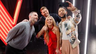 The Voice Season 27 coaches Adam Levine, Kelsea Ballerini, Michael Buble and John Legend take a selfie.