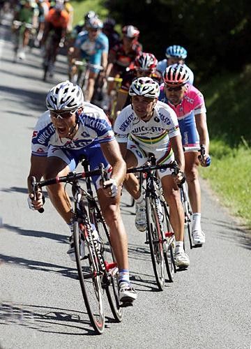 Matteo Tosatto (Quick Step) leads team-mate Paolo Bettini early in the race.
