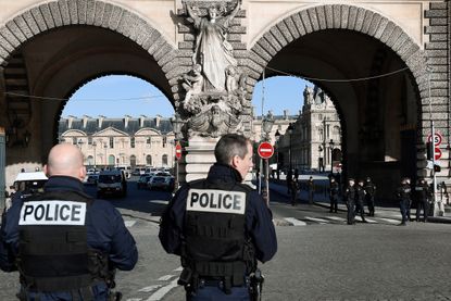 Police patrol near the Louvre museum in Paris