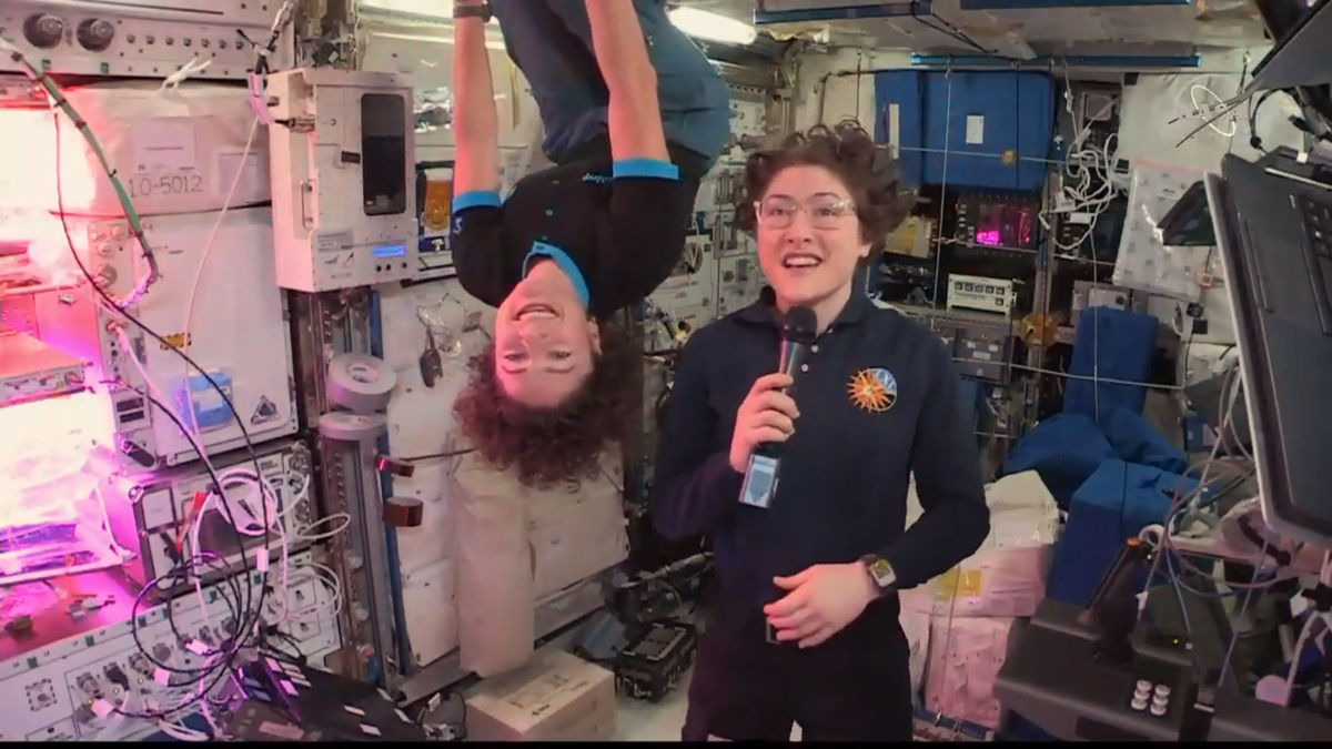 NASA astronauts Jessica Meir and Christina Koch demonstrate how their hair stands up in the microgravity environment on board the space station, whether they&#039;re &quot;upside down&quot; or not. 