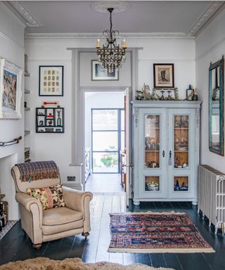 living room with antique and vintage furniture and ornate coving
