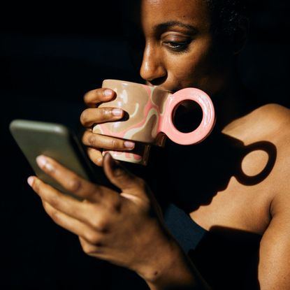 Health Writer Katie Sims testing the Lumie SAD lamp for review