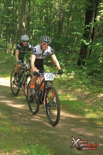 Lisa Krayer (Adventure 212/Specialized) being chased by Sarah Agena (Hidden Bay/Ciderboys)