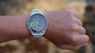 A close-up picture of our reviewer testing the Garmin Forerunner 970
