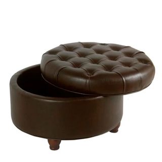 round leather ottoman in brown