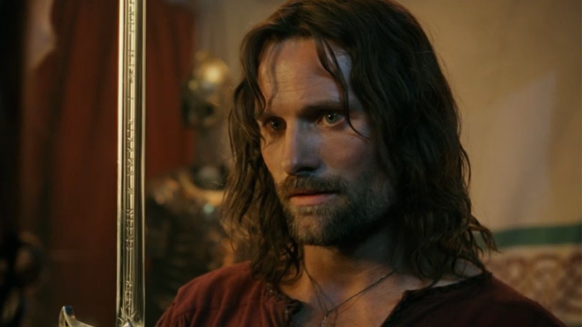 Aragorn holding up his sowrd in The Return of the King.