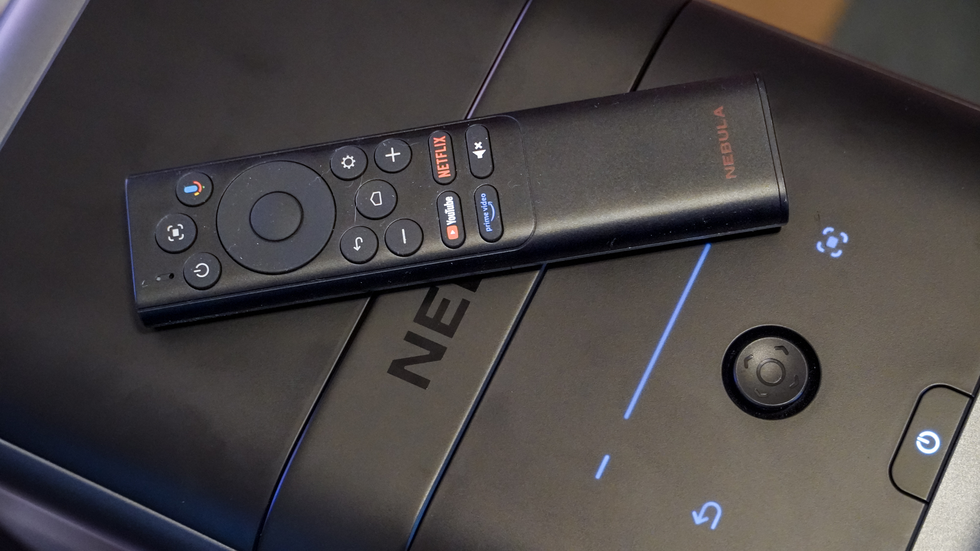 The remote for an Anker Nebula X1 laser projector.
