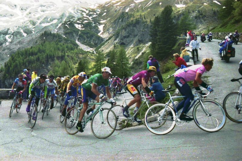 The maglia rosa Evgeni Berzin riding up the Mortirolo in 1994