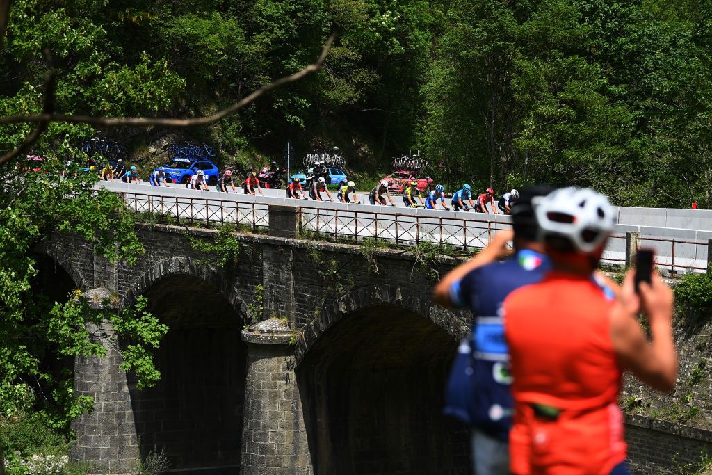 GENOA ITALY MAY 19 A general view of the peloton competing during the 105th Giro dItalia 2022 Stage 12 a 204km stage from Parma to Genova Giro WorldTour on May 19 2022 in Genoa Italy Photo by Tim de WaeleGetty Images
