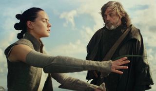 Rey and Luke Skywalker training in Star Wars: The Last Jedi