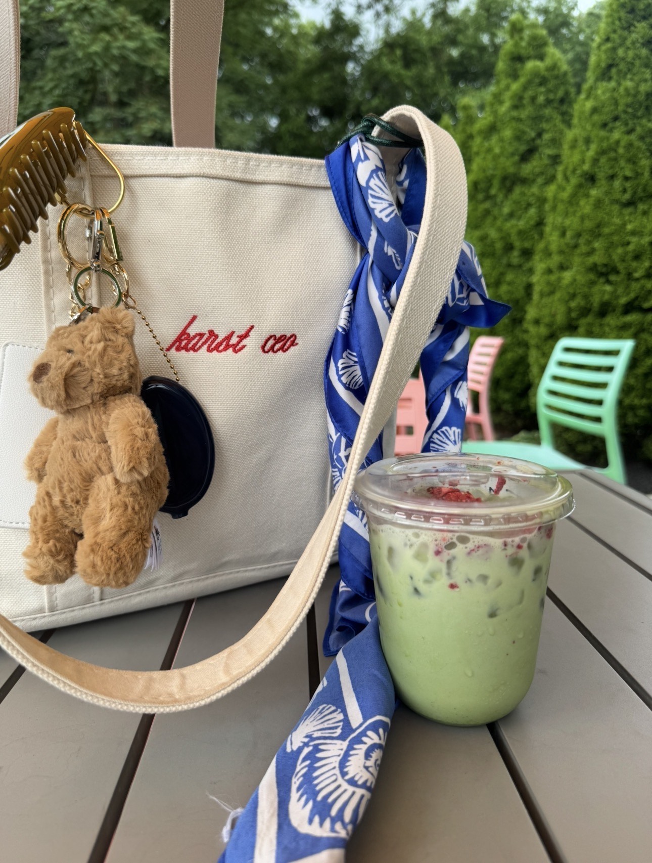 Emily Karst's white analog bag with red embroidery