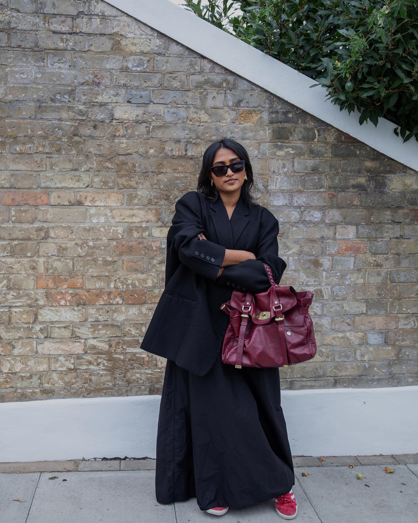 An image of @chiarasatelier carrying one of the most popular designer handbags.