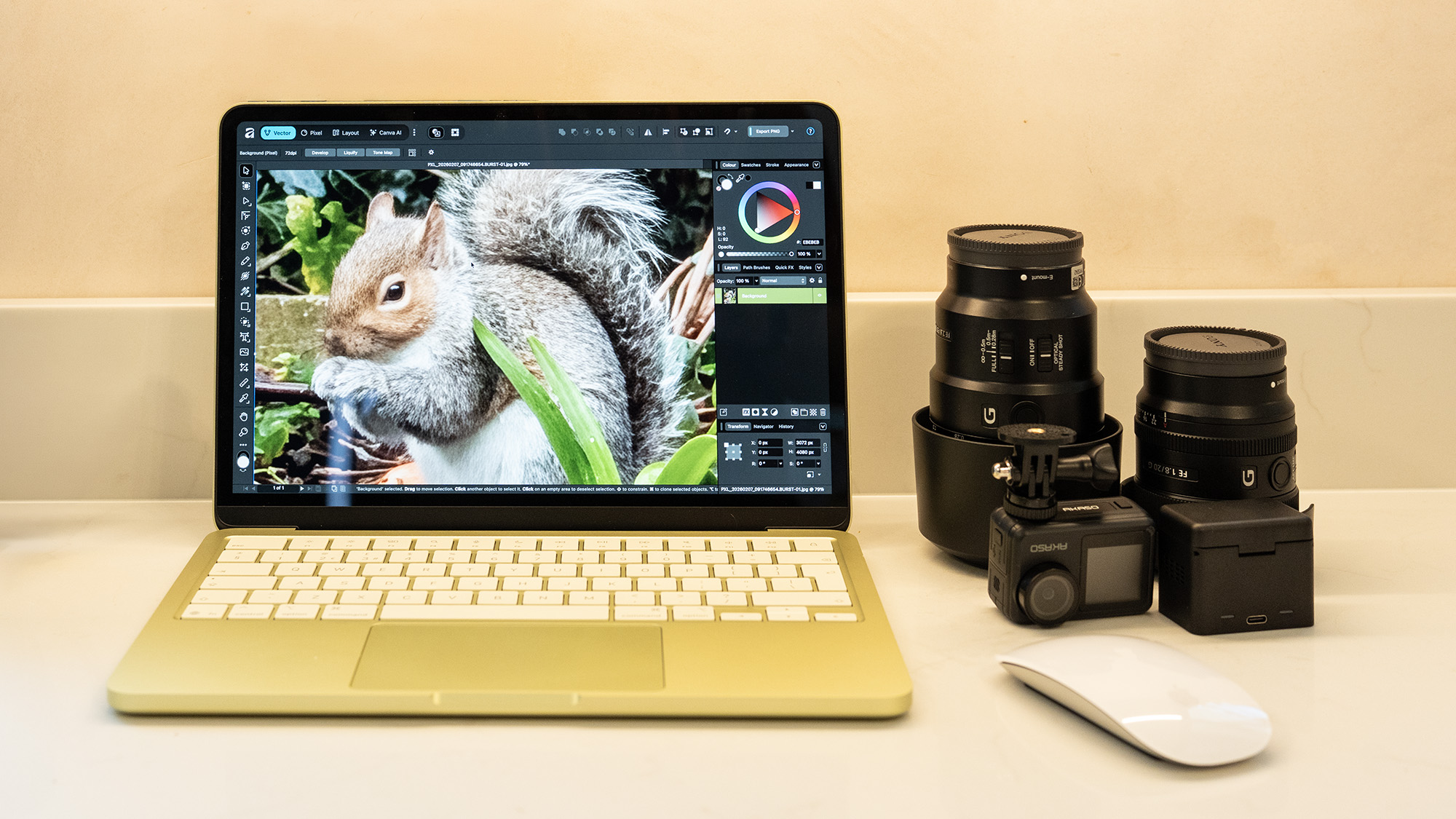 Apple MacBook Neo laptop in yellow on a desk