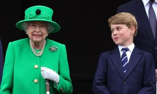 Queen in green on balcony with George